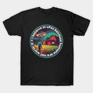 I belive in ufos because humans are not worth it T-Shirt